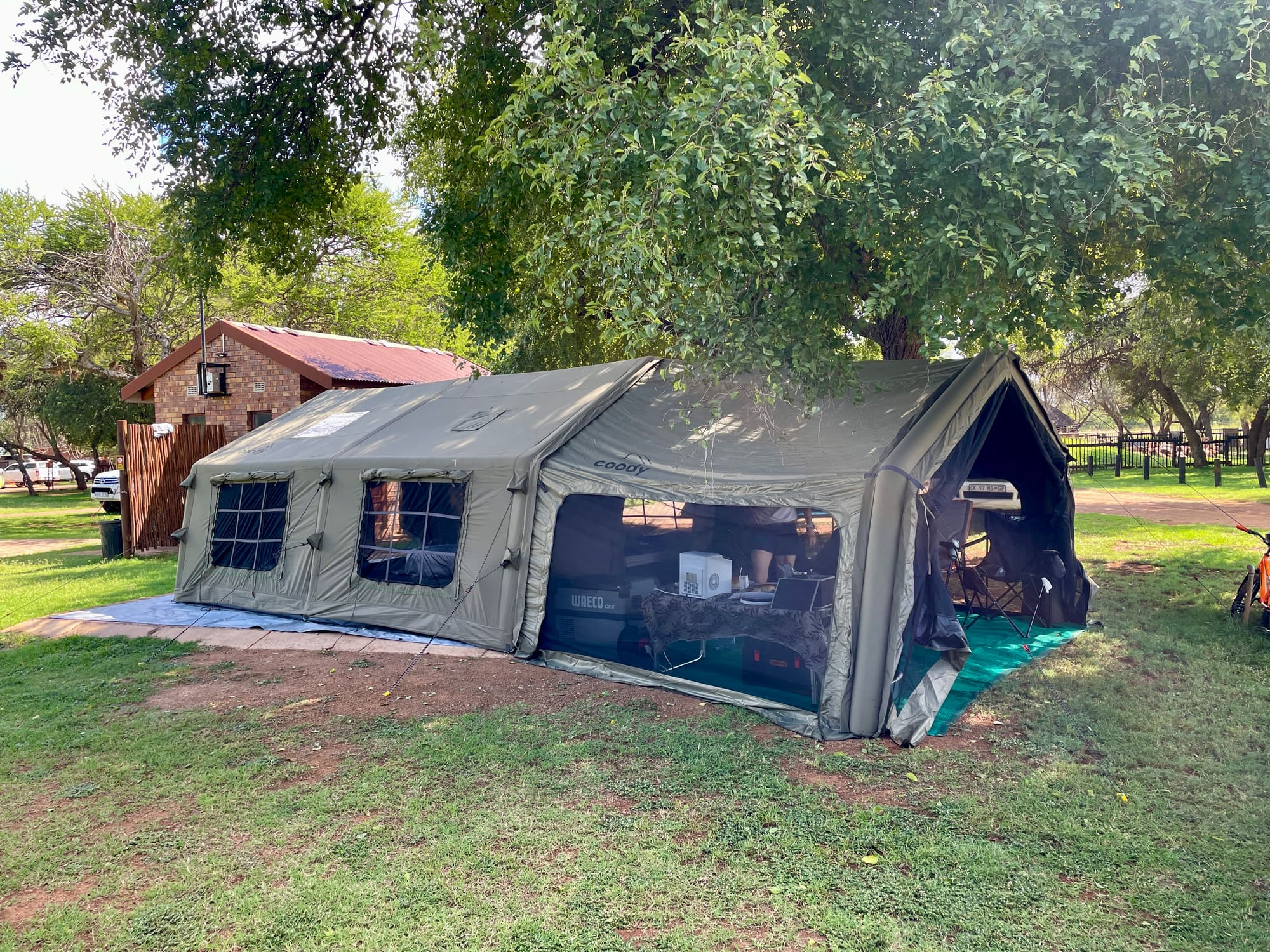 Coody Familia inflatable tent set up at Sondela, Bela Bela, fully extended under the trees