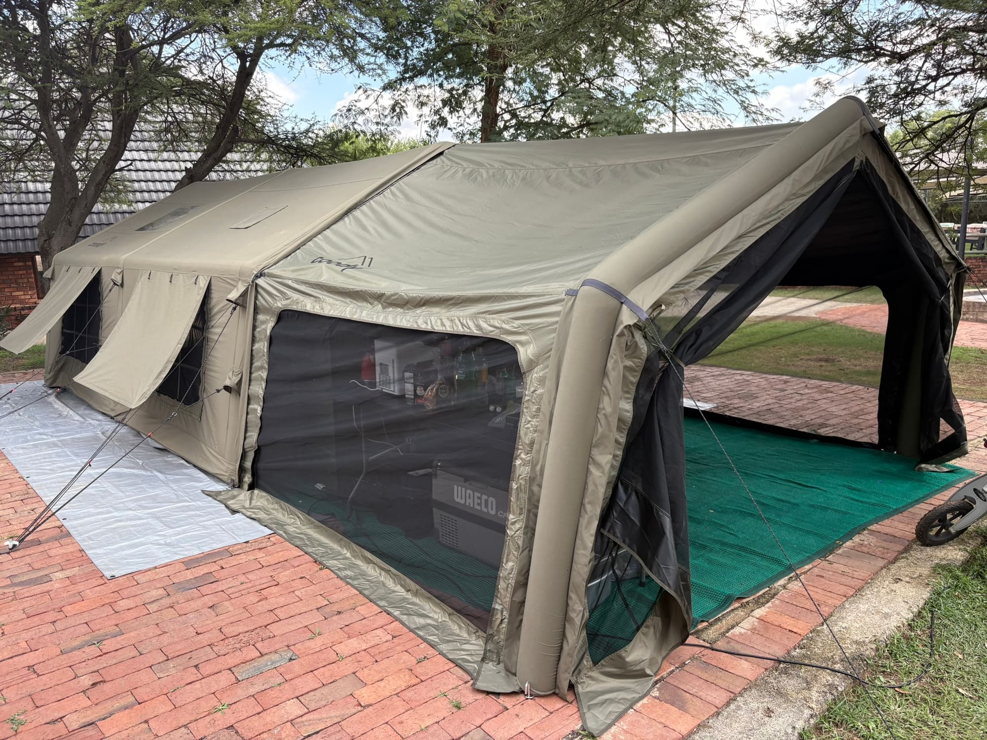 Coody Familia inflatable tent set up at Dube, Brits, fully extended with clear PVC windows down