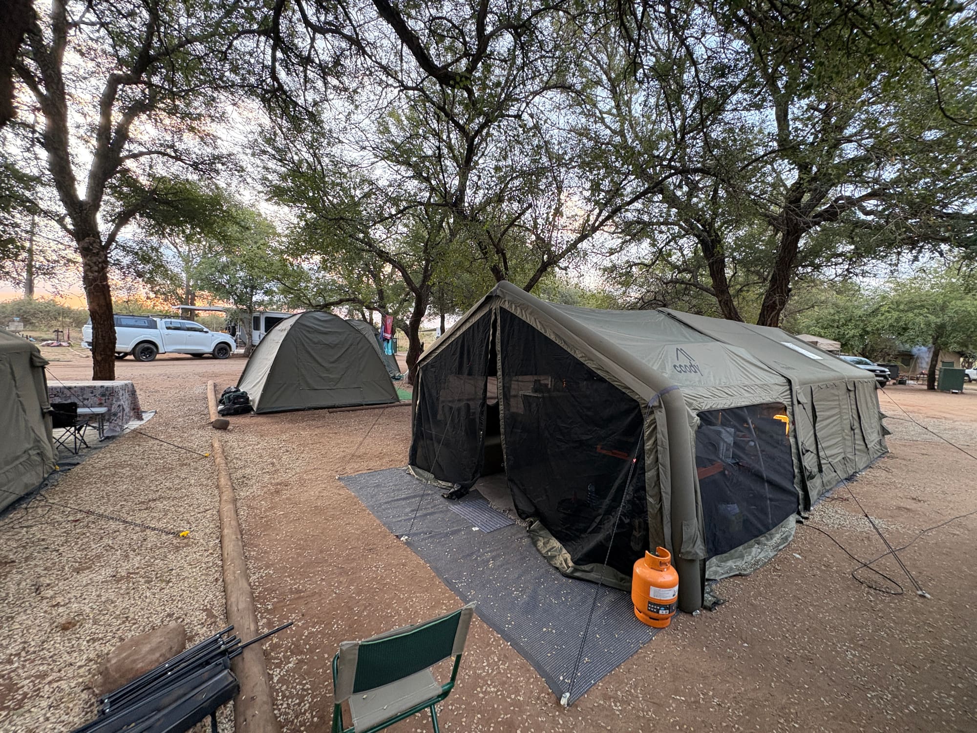 Coody dome and Familia tents at dusk at Crocodile Bridge