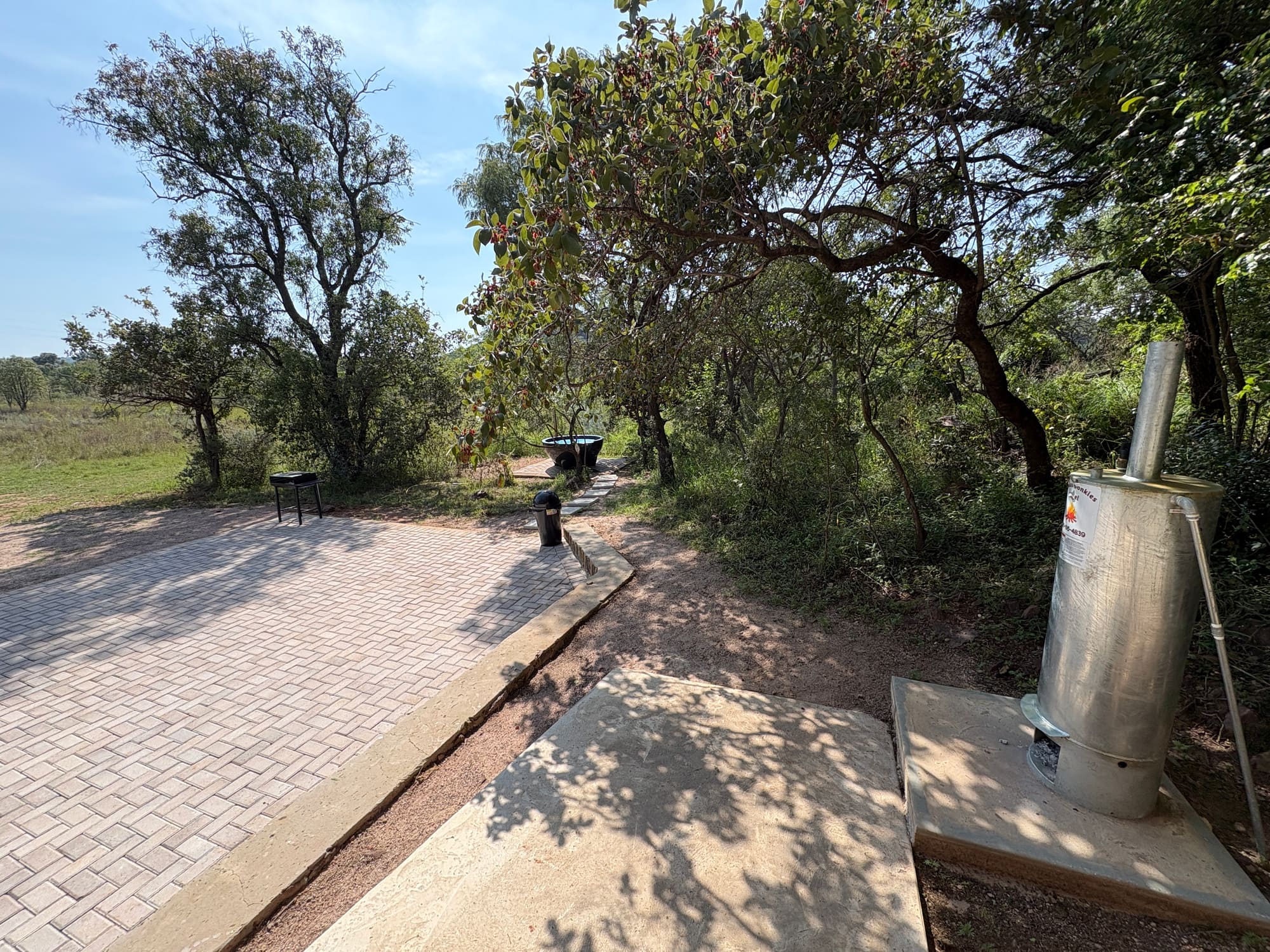Another view of the ablution area at Kleinood Guest Farm, gas geyser and braai visible