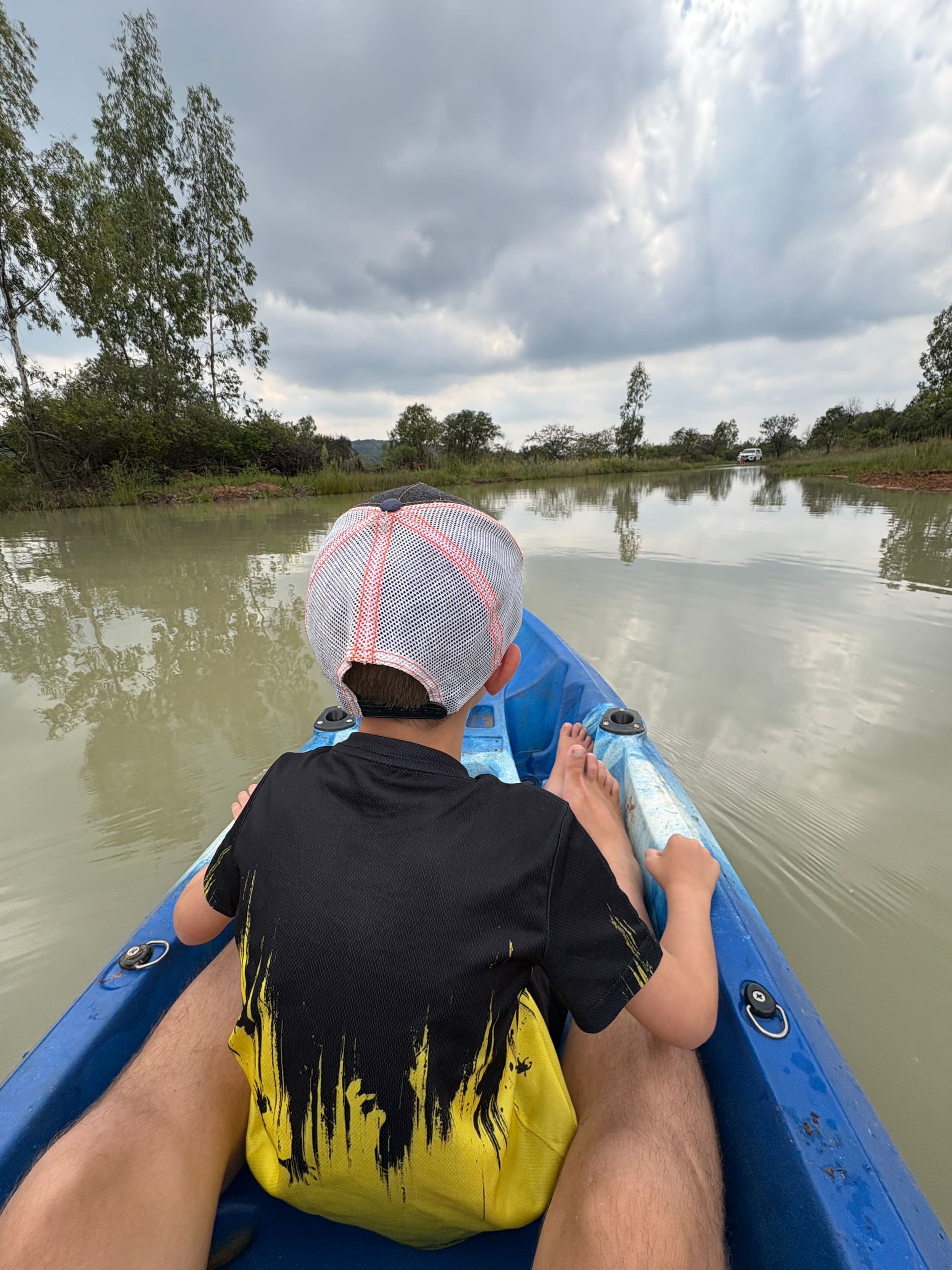 Kids in a small boat on the dam at Kleinood Guest Farm