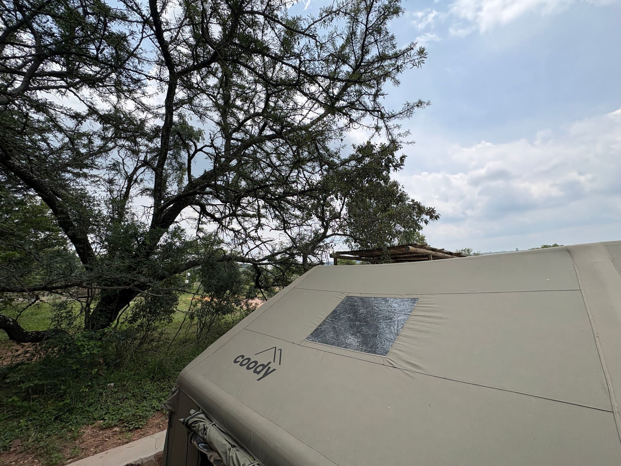 Another close-up of the Coody roof branding at Kleinood, farm bush visible behind