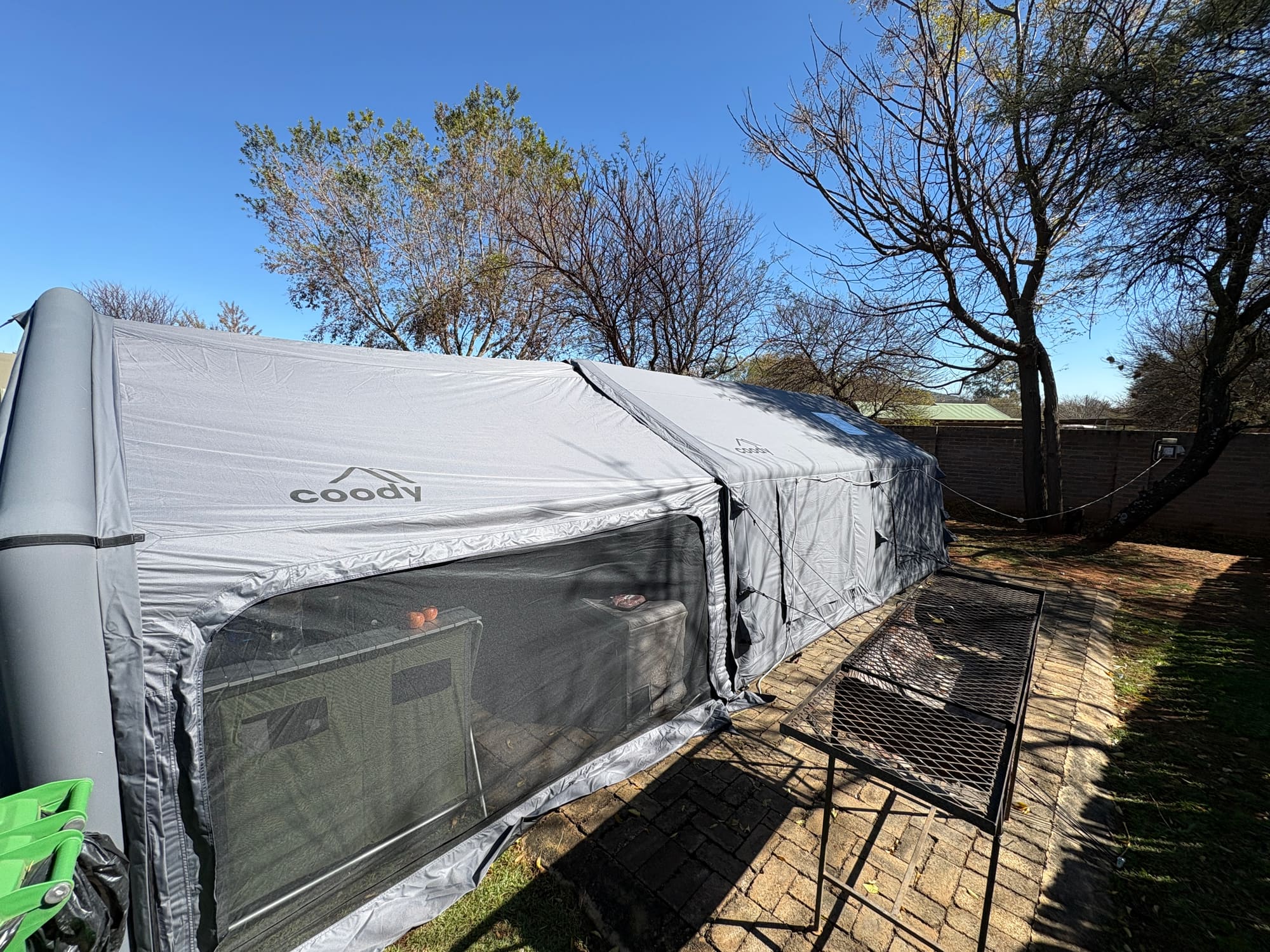 Coody Familia inflatable tent in grey with canopy extended, set up at Konka, Magaliesburg