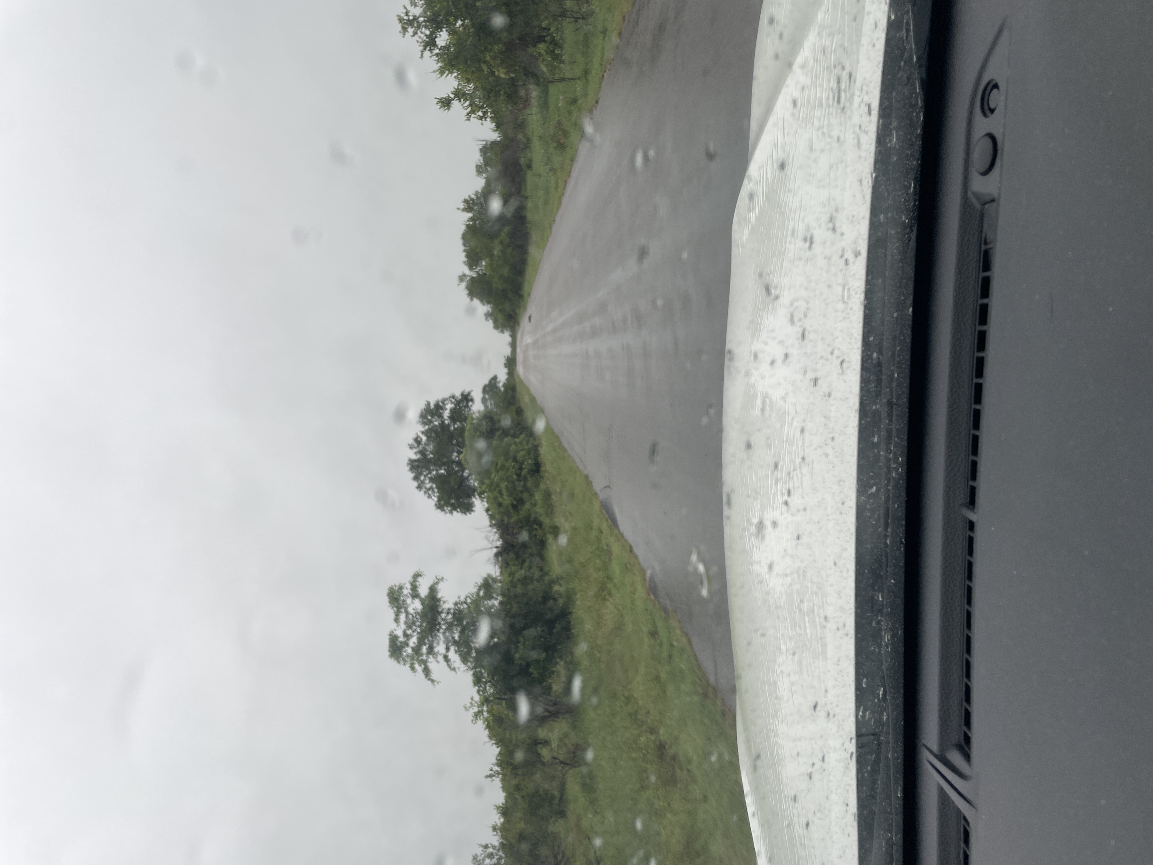 Driving out of Kruger National Park in heavy rain, leaving after 8 days of camping at Berg en Dal