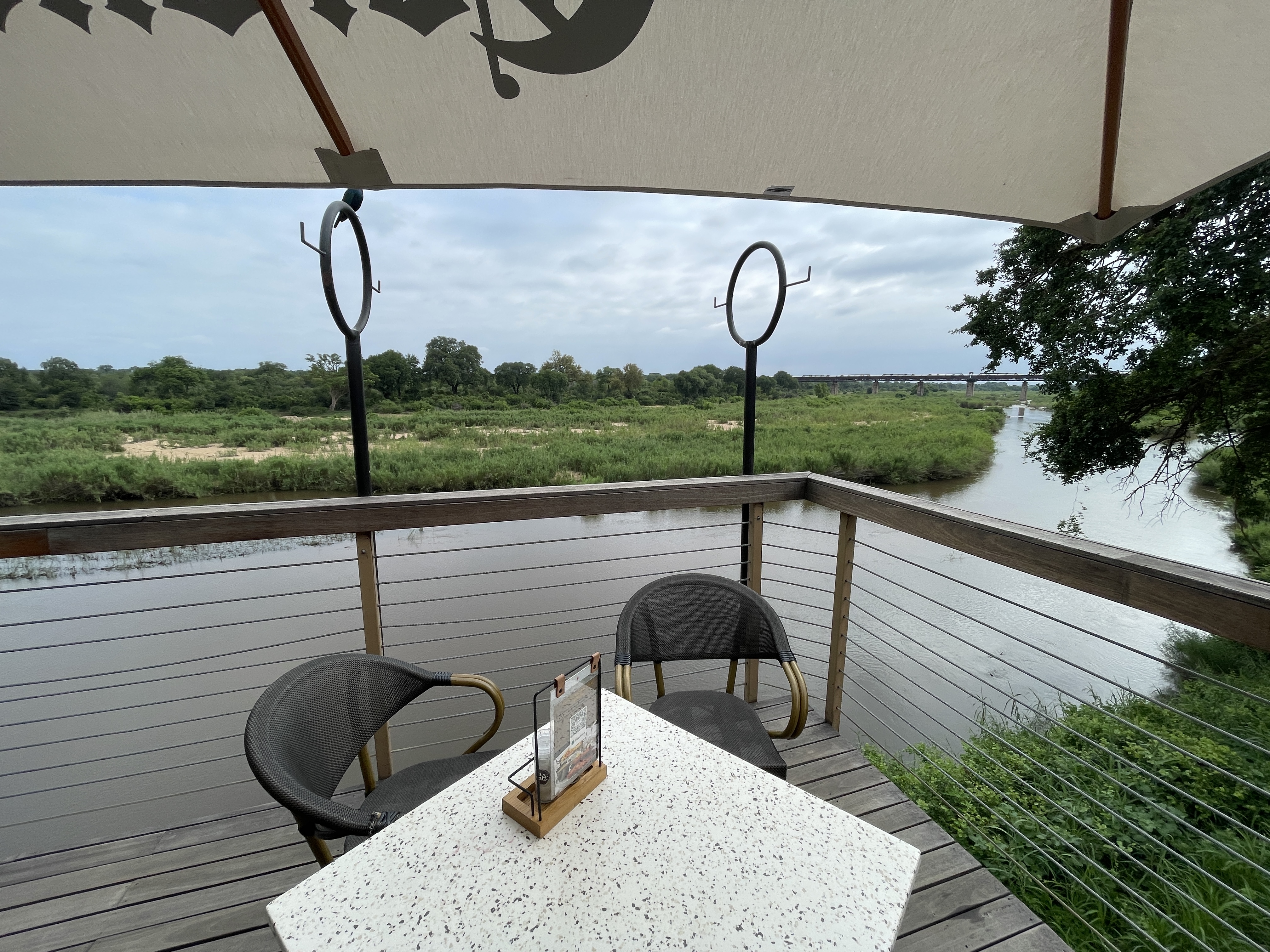 View from the Skukuza restaurant deck overlooking the Sabie River, Kruger National Park, with storm clouds building