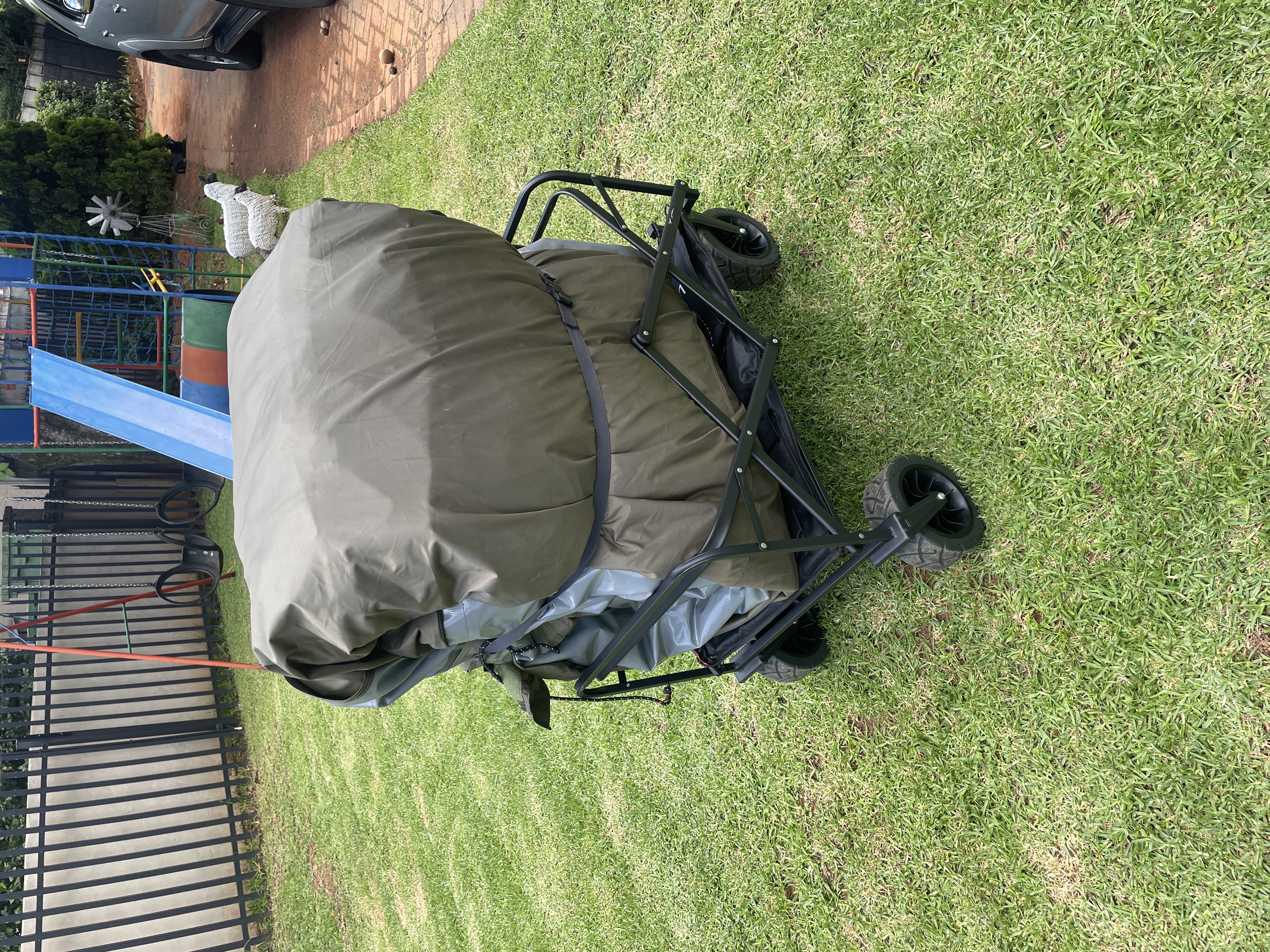 Coody Familia inflatable tent packed into its trolley bag, ready for the next camping adventure