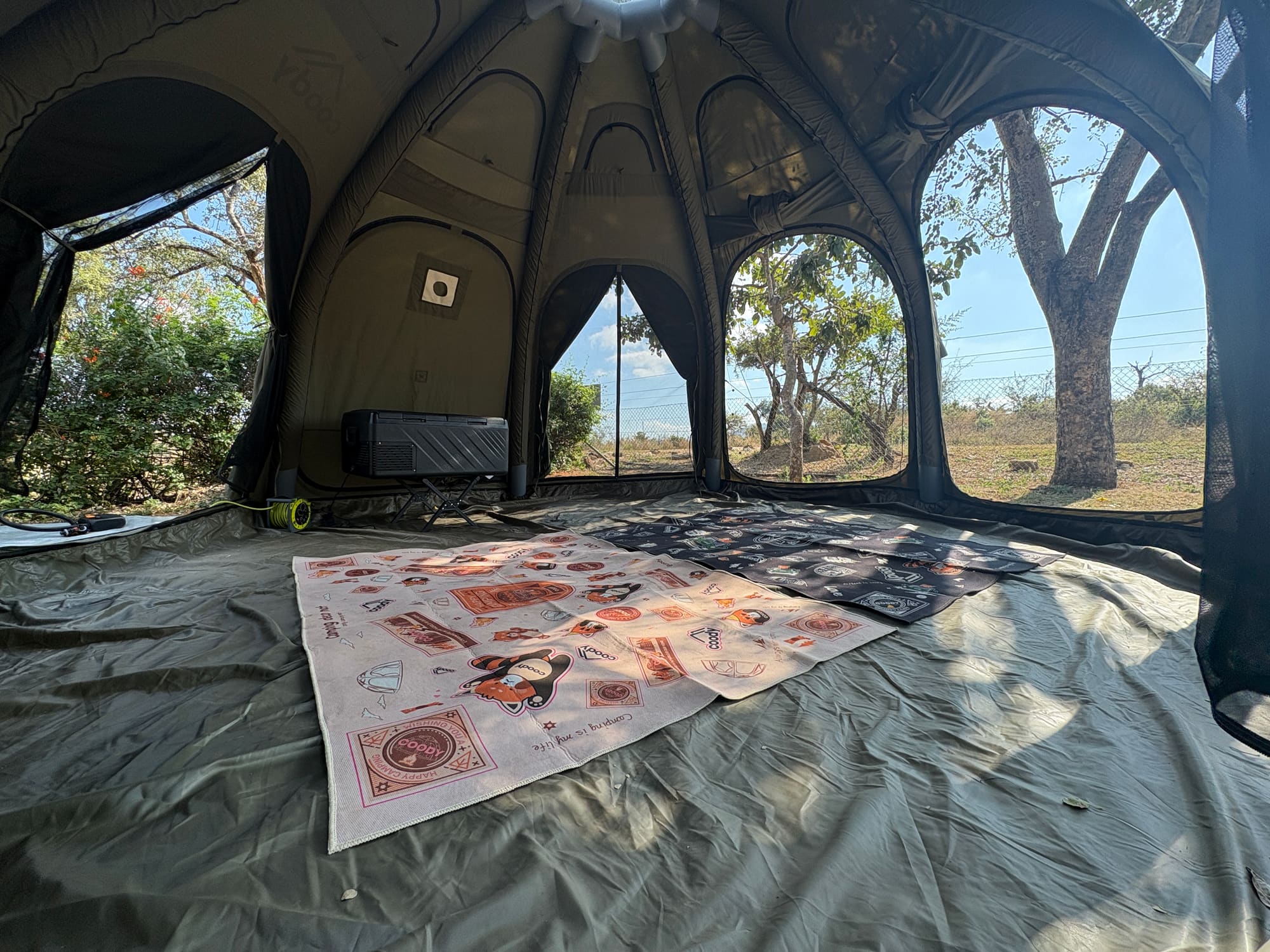 Interior of the Coody dome tent at Malelane, mats laid out on the floor