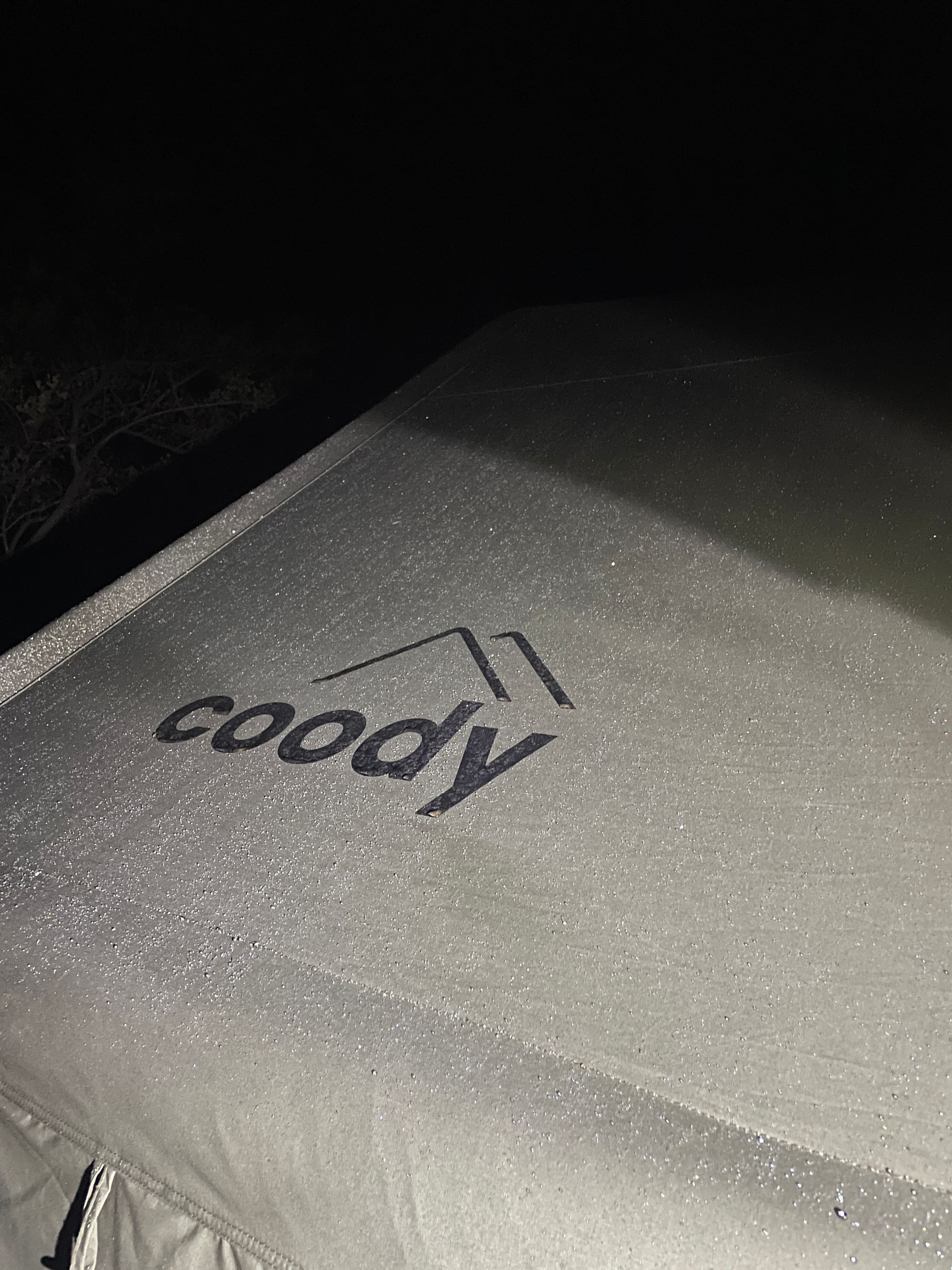 Coody Familia inflatable tent set up under a bare winter tree at Willemsrus, Dinokeng, awning extended over the braai area