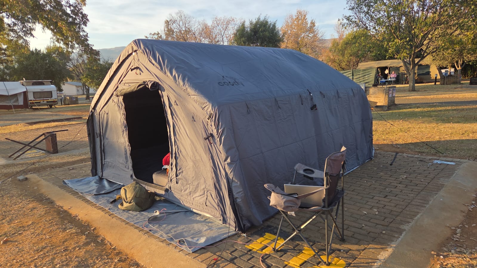 Jaun's grey Coody 13.6 set up at a campsite in the Drakensberg